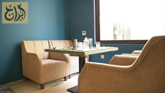 Restaurant seating inside Abraj Suites Hotel, Al Mansoura, Doha