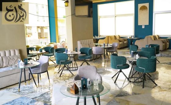 Cafe lounge seating area at Abraj Suites Hotel Doha