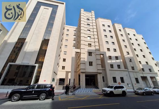 Abraj Suites Hotel building exterior on Hisham Bin Oqba Street, Al Mansoura, Doha