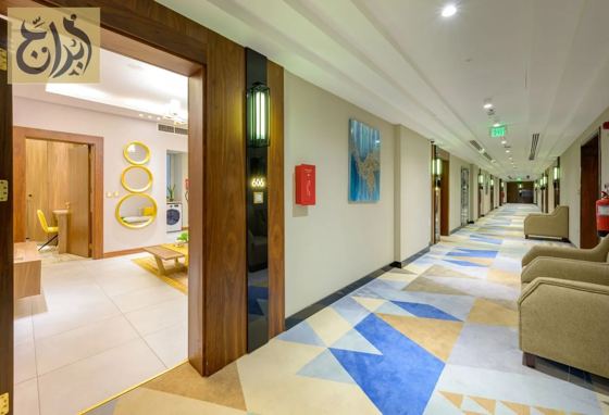 Guest floor corridor leading to the suites at Abraj Suites Hotel Doha